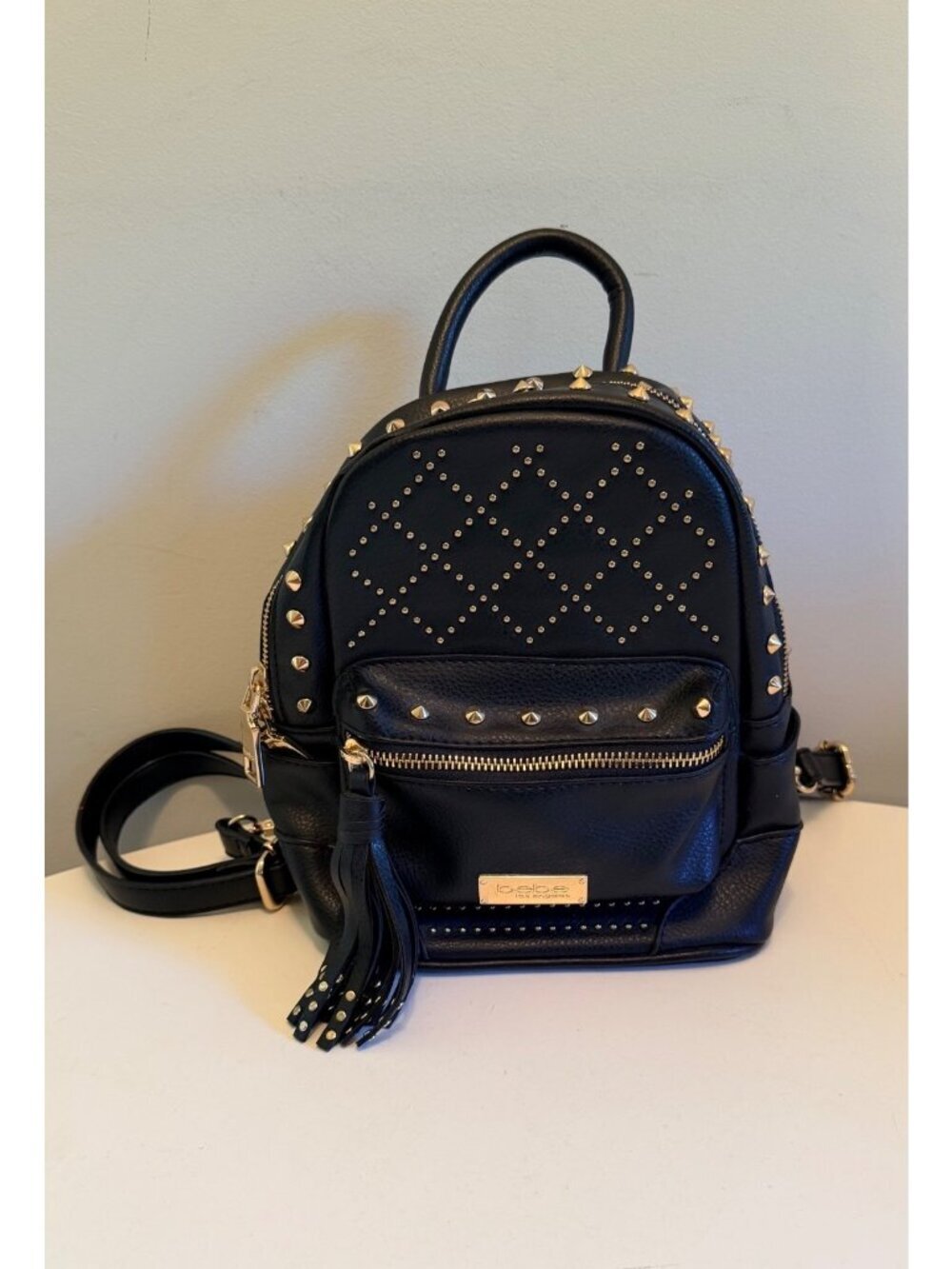 Bebe Black Mini Backpack Purse With Gold Studs & Tassel Accent